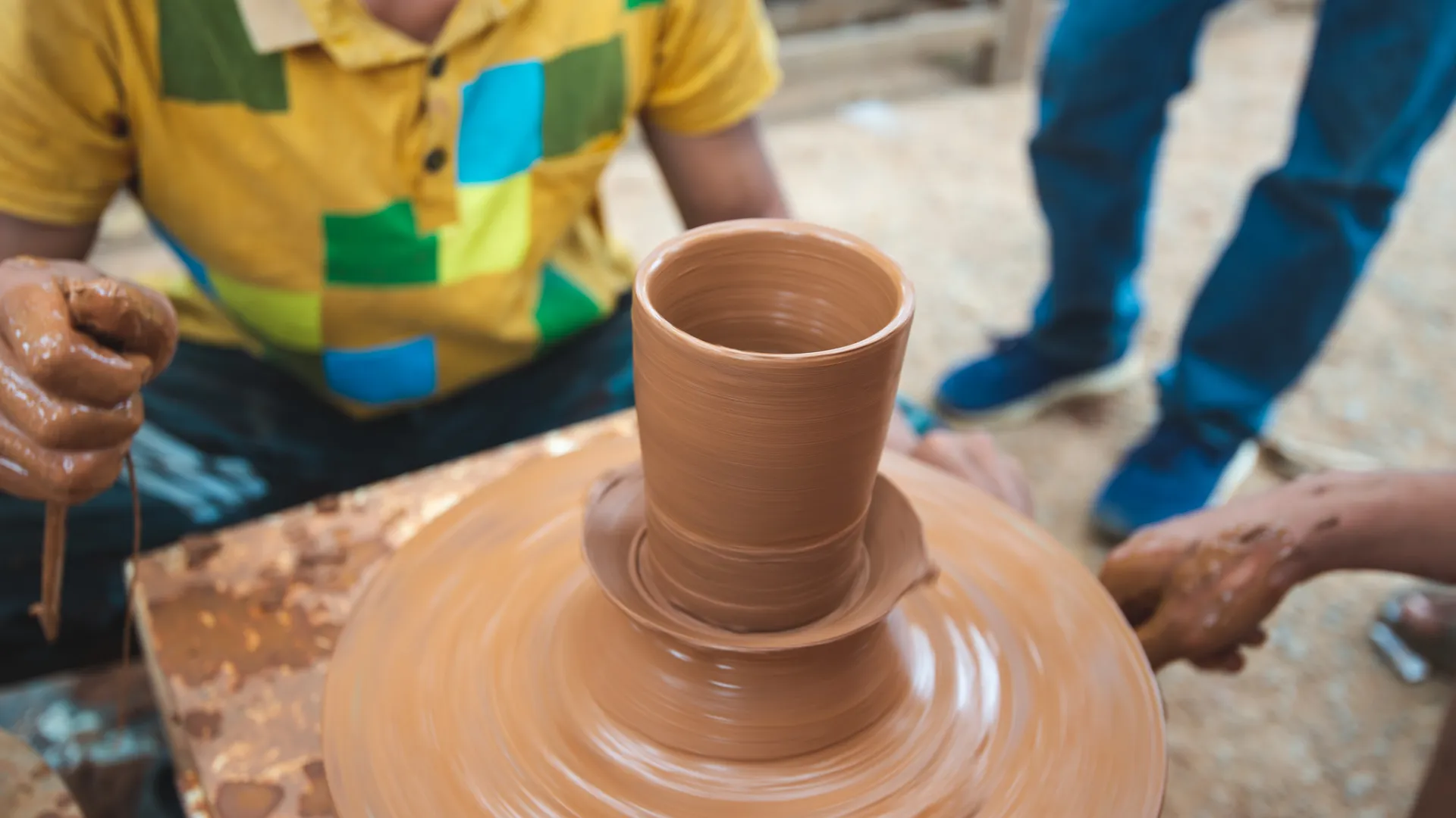 Working with Clay to create beautiful vessels.